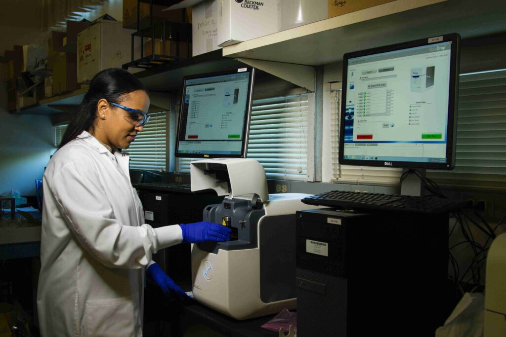 A student is shown in a STEM lab.